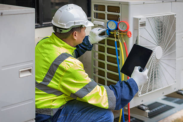 Professional Emergency Hvac Repair technician working in Dousman, WI